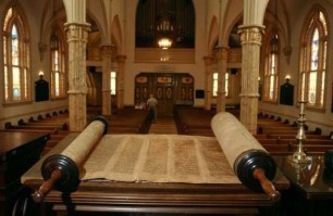 2-5-8_crippled_woman_torah_scrolls